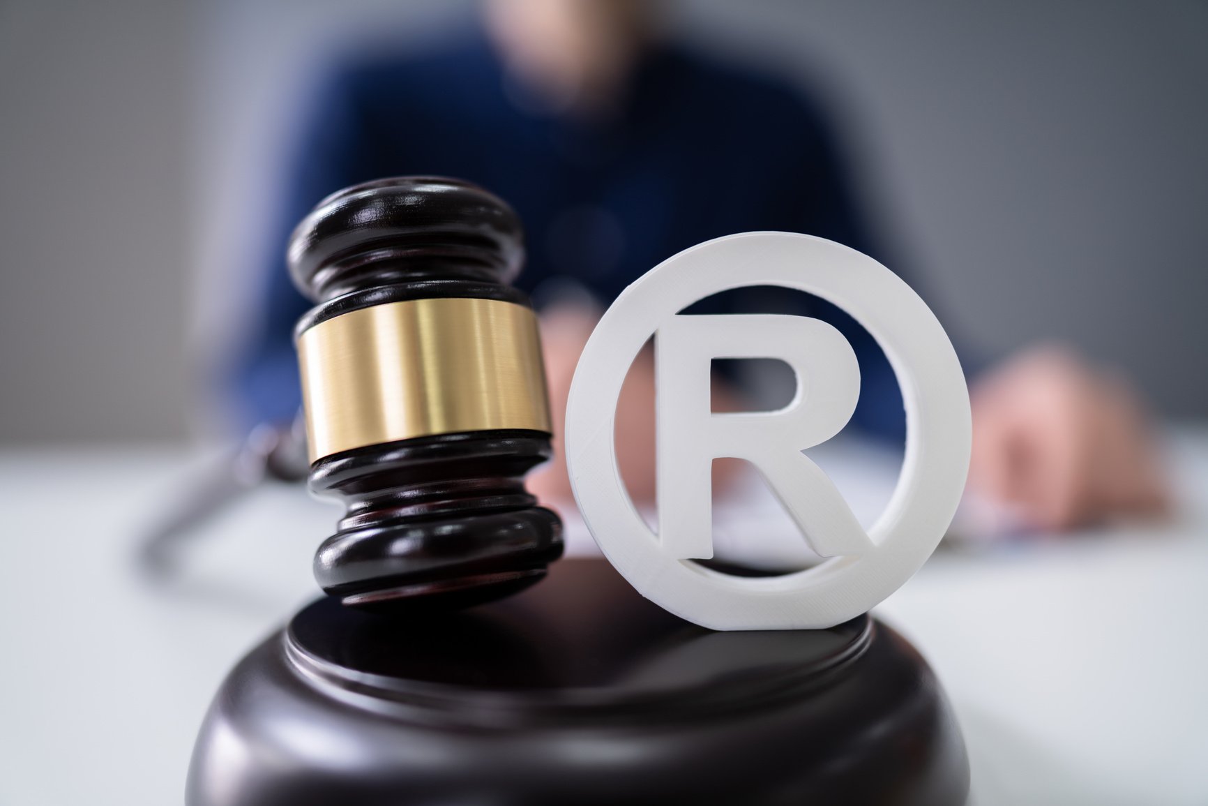 Judge Striking Mallet On Trademark Symbol